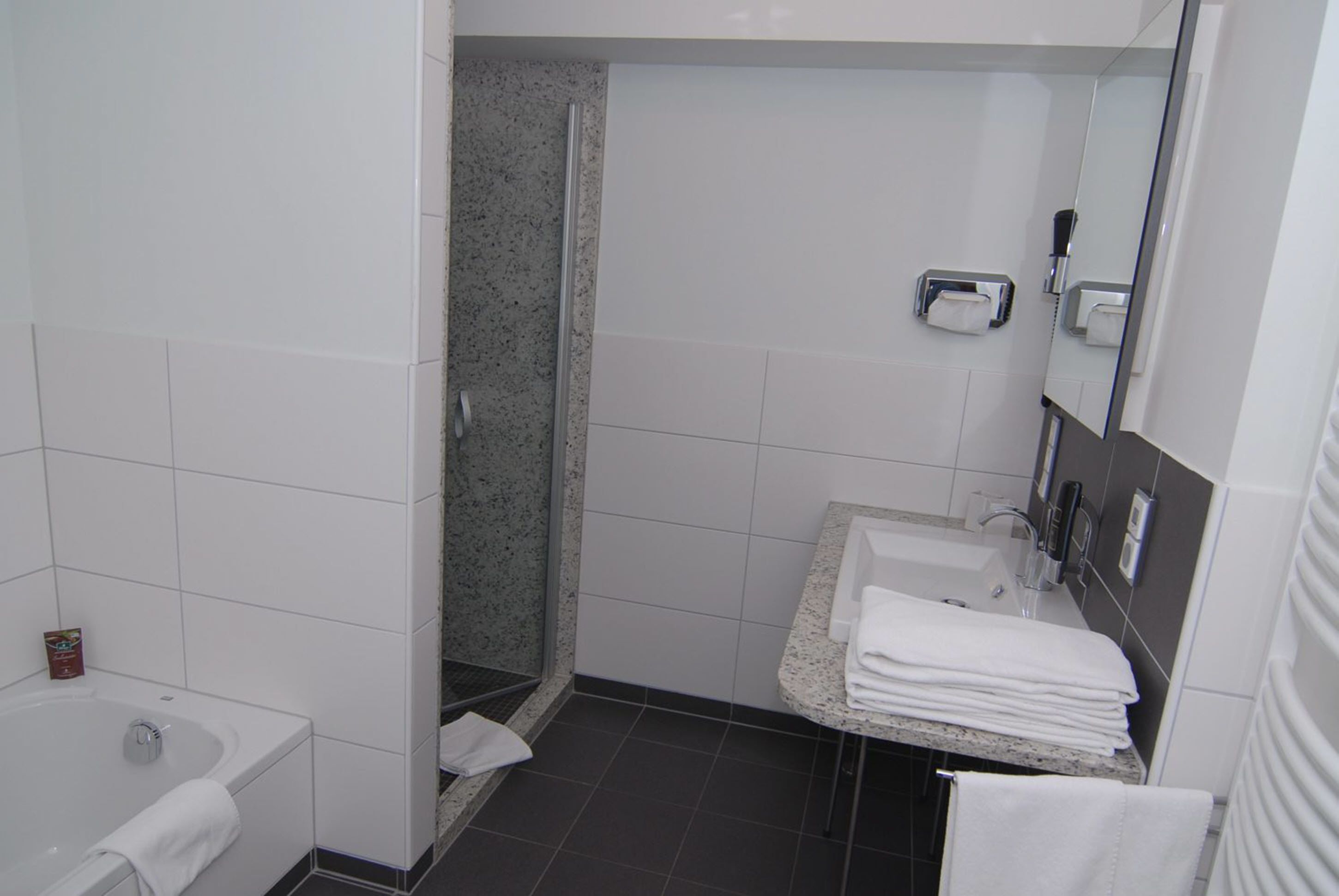 shower, free toiletries, hair dryer, towels