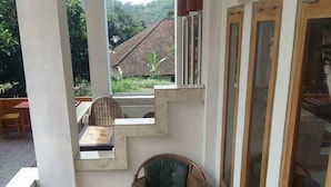 Economy Triple Room | Terrace/patio - Alola Inn (Padangbai)