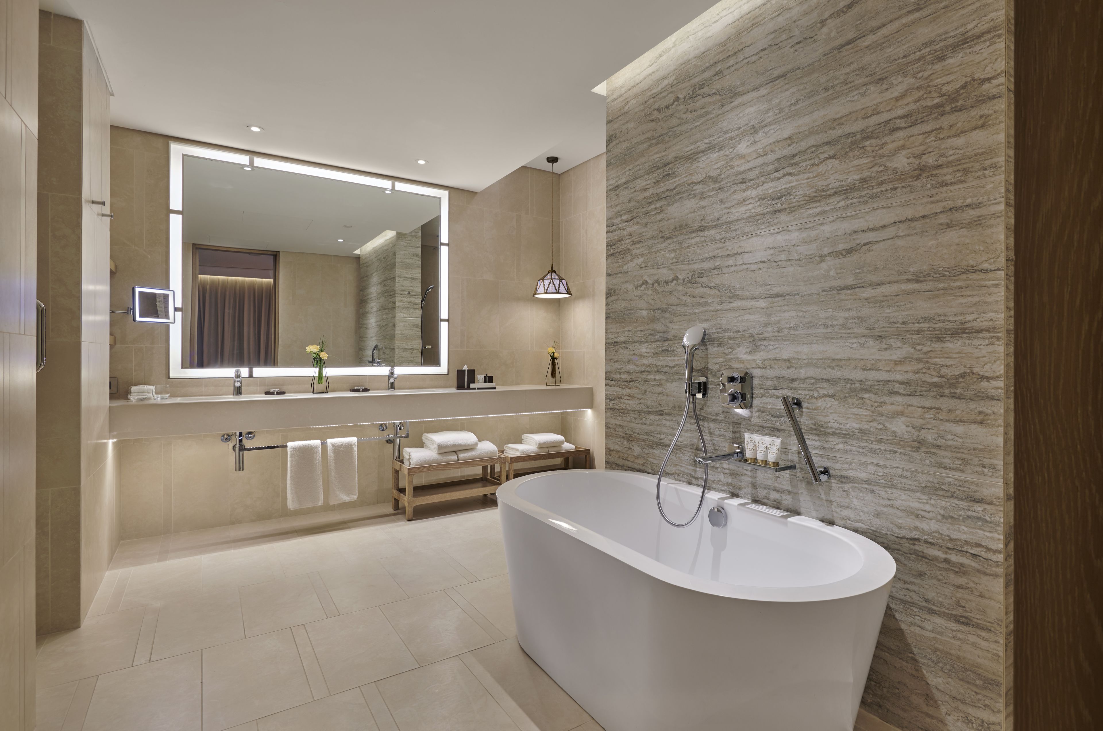 separate bathtub and shower, deep-soaking bathtub, rainfall showerhead