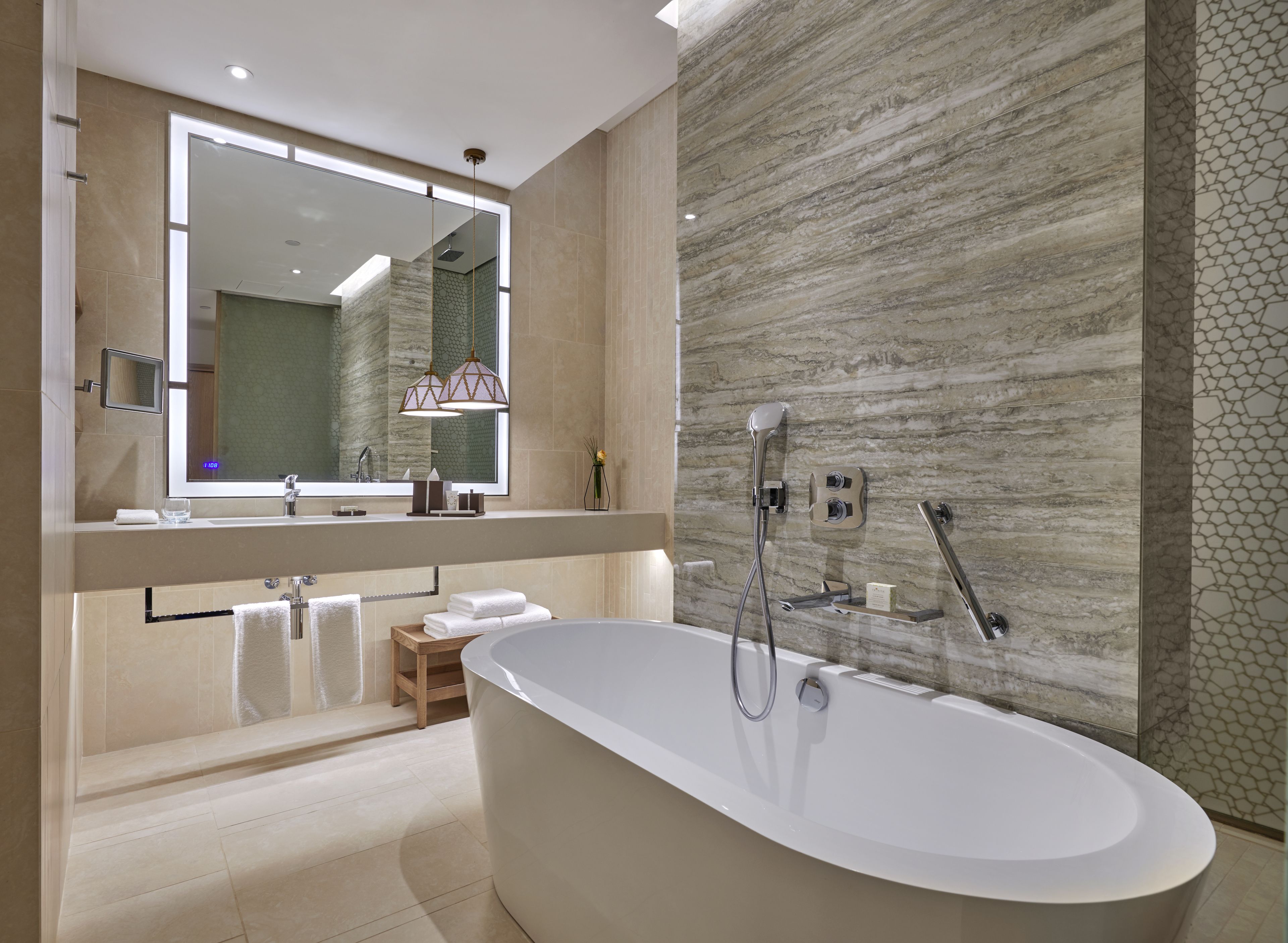 separate bathtub and shower, deep-soaking bathtub, rainfall showerhead