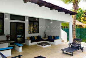 Traditional House, Multiple Beds, Non Smoking (Casa Pelicanos 7) | Living room | Flat-screen TV - Casas Pelicanos (Iztapa)