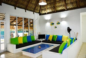 Design House, Multiple Beds, Non Smoking (Casa Pelicanos 3) | Living area | Flat-screen TV - Casas Pelicanos (Iztapa)