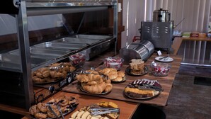 A buffet with various baked goods and pastries. - Manjimup Motor Inn (Manjimup)