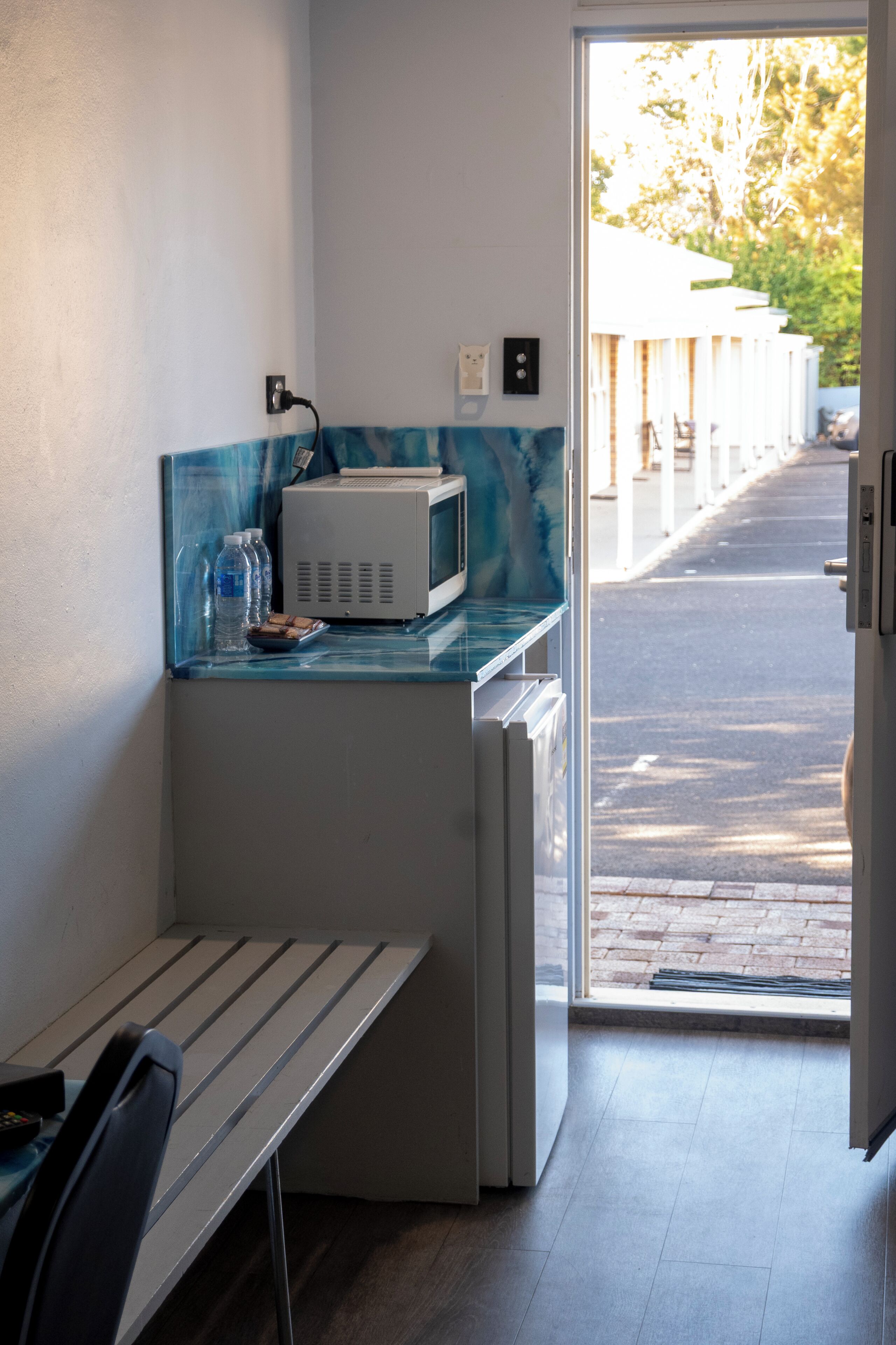 Mini-fridge, coffee/tea maker, electric kettle, toaster