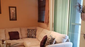 Deluxe Apartment, 1 Bedroom, Non Smoking | Living room | 45-inch flat-screen TV with digital channels, TV, DVD player