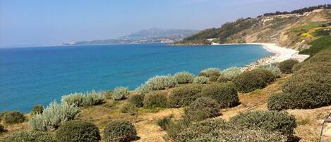 Plage, chaises longues