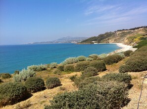 On the beach, sun loungers