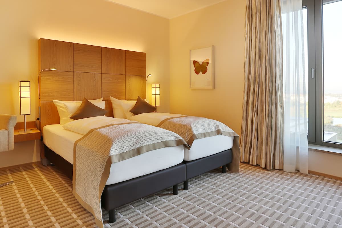 Hypo-allergenic bedding, in-room safe, desk, laptop workspace