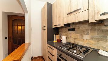 Réfrigérateur, four, plaque de cuisson, cafetiÚre/bouilloire