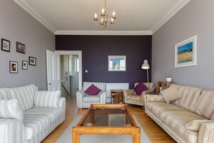 Deluxe House, 4 Bedrooms, Non Smoking | Living room | 24-inch Smart TV with satellite channels, TV, Netflix