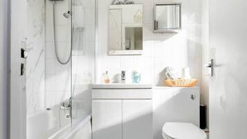 Combined shower/bathtub, hair dryer, towels, soap