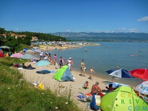 4 star romantic villa, just a minute walk to the beach, heated pool.