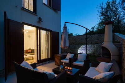 4 star romantic villa, just a minute walk to the beach, heated pool.