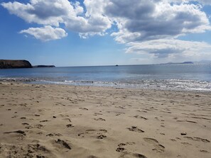 Beach nearby, sun loungers