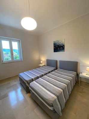 2 bedrooms, in-room safe, iron/ironing board, WiFi