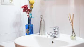 Bathtub, hair dryer, towels