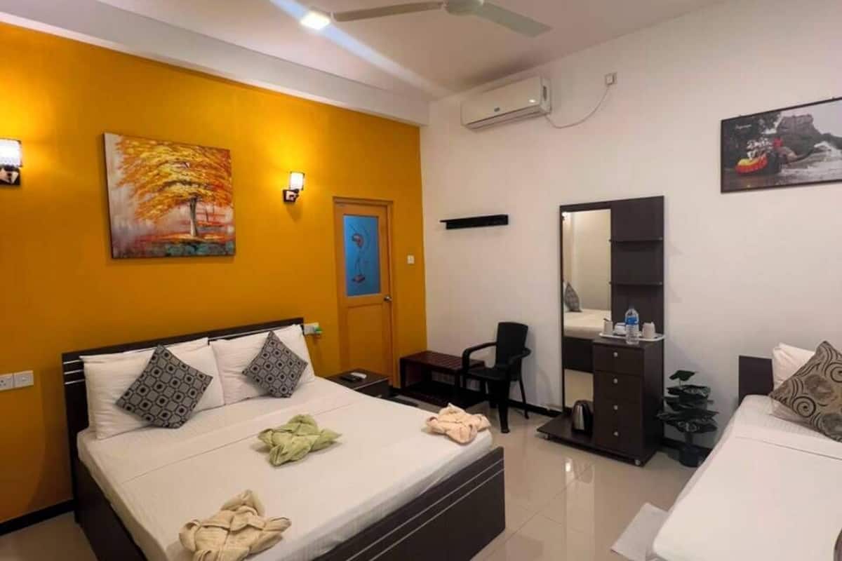 Luxury Double or Twin Room, Mixed Dorm, Garden View | In-room safe, soundproofing, iron/ironing board (on request), free WiFi
