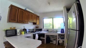 House, Multiple Beds, Non Smoking | Private kitchen | Fridge, microwave, oven, stovetop