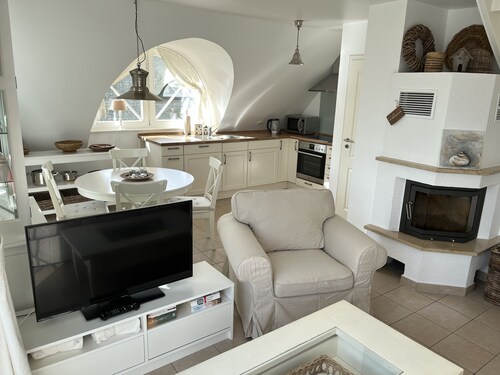 Exclusive apartment on two floors near the beach with a fireplace