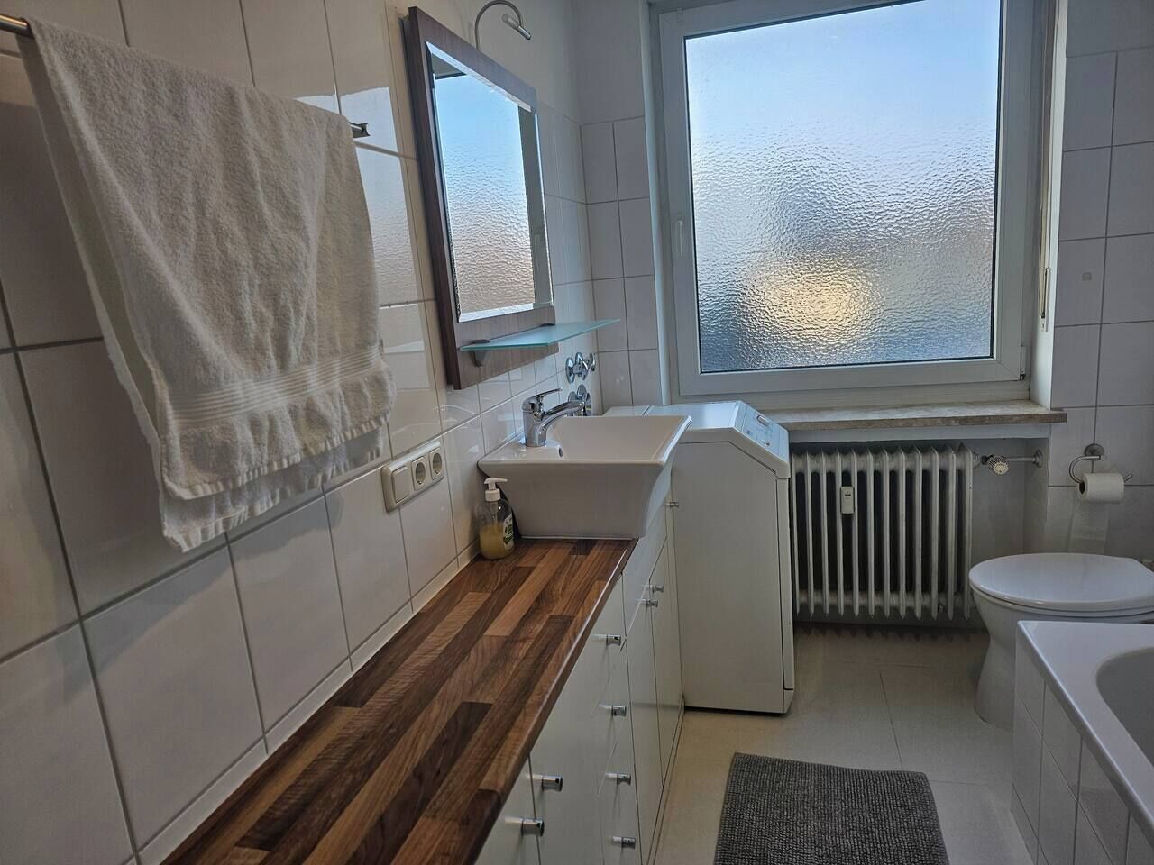 Combined shower/tub, hair dryer