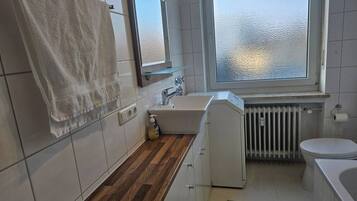 Combined shower/tub, hair dryer