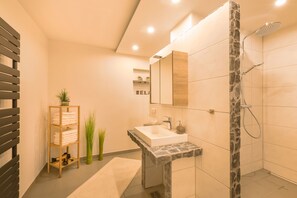 Bathtub, hair dryer, towels, soap
