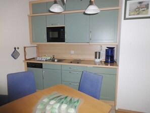 Fridge, dishwasher, coffee/tea maker, electric kettle