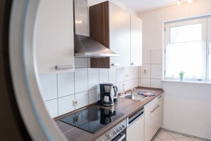 Réfrigérateur, micro-ondes, four, lave-vaisselle