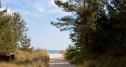 Ferienwohnung Leonie EG - Reethaus direkt am Strand