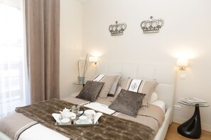 2 habitaciones, tabla de planchar con plancha, cuna de viaje y wifi 