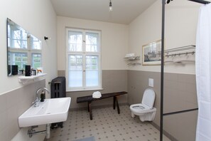 Shower, hair dryer, towels, toilet paper