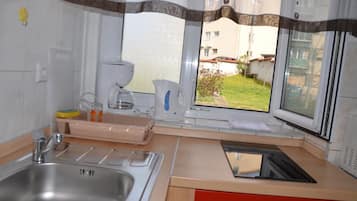 Fridge, microwave, coffee/tea maker, highchair