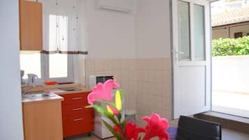 Fridge, microwave, coffee/tea maker, highchair