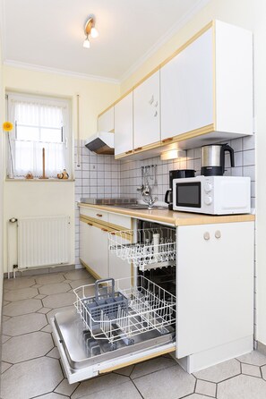 Fridge, microwave, dishwasher, coffee/tea maker