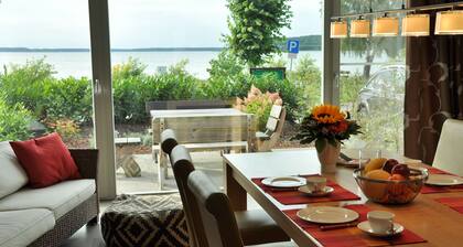 Maison de plage, Ă 200 mĂštres carrĂ©s. Wf., Directement sur le Plauer See, MĂŒritz, 30m de la plage, Sky