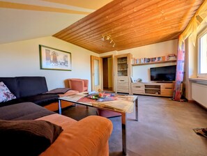 Smart TV, books, music library, stereo