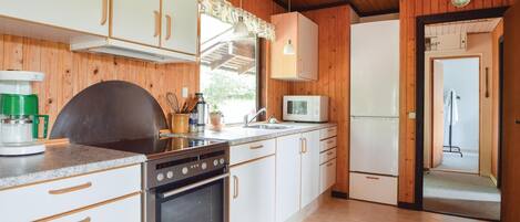 Fridge, stovetop, coffee/tea maker