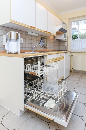 Fridge, microwave, dishwasher, coffee/tea maker