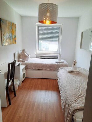 2 slaapkamers, een strijkplank/strijkijzer, wifi, beddengoed