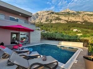 Outdoor pool, a heated pool - Top Features! Holiday house with heated pool with sea view, for 10 people (Makarska)