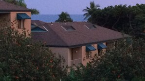 A building with multiple skylights and a view of the ocean. - Maui Vista -  Fully Renovated, New Kitchen and Bathroom.  Best Location. (Kihei)