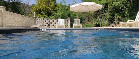 Outdoor pool, sun loungers