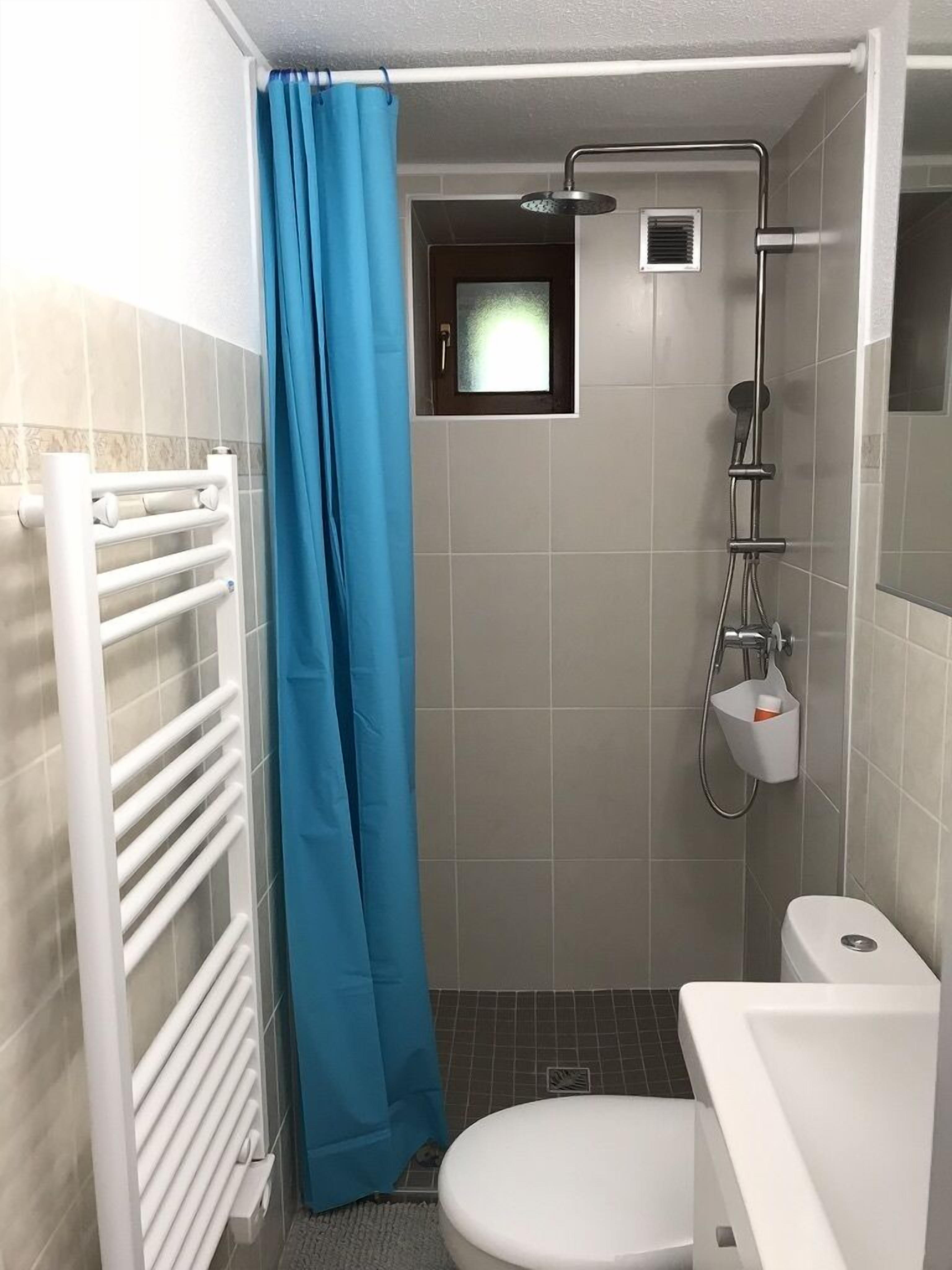 Shower, hair dryer, soap, shampoo