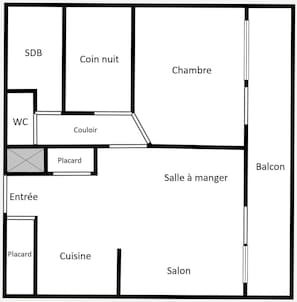 A hotel floor plan with labeled rooms including SDB, WC, Coin nuit, Chambre, Couloir, Salle à manger, Salon, and Balcon.