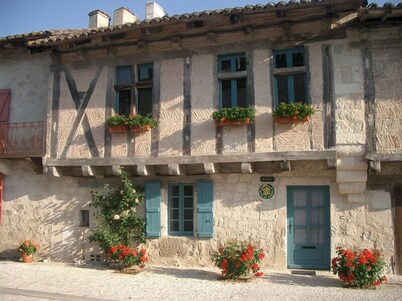 In a listed village, half-timbered house overlooking a wooded valley