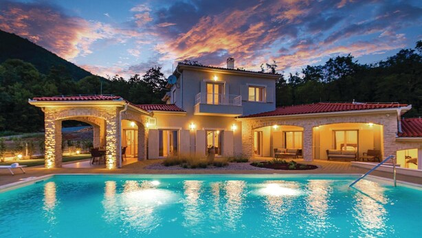 A two-story house with a swimming pool, stone arches, and a balcony. - Gorgeous home in Veprinac with sauna (Veprinac)
