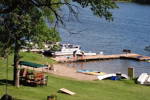 Enjoy lakeside relaxation with a picnic table and dock access.