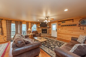 TV, fireplace - Wooded Retreat with Hot Tub & Pool Table Near Wisp (McHenry)