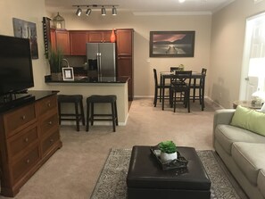 TV, fireplace, books - Getaway -Relaxing, Clean and Simply Decorated 2nd Floor Condo -30 days minimum  (Scottsdale)