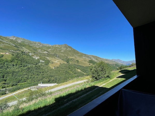 A mountainous landscape with a clear sky.